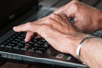 old person typing
